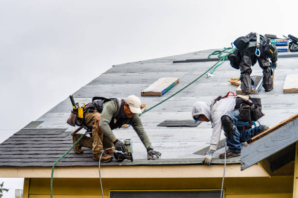 Professional Gutter Installation technician working in Portland, IN